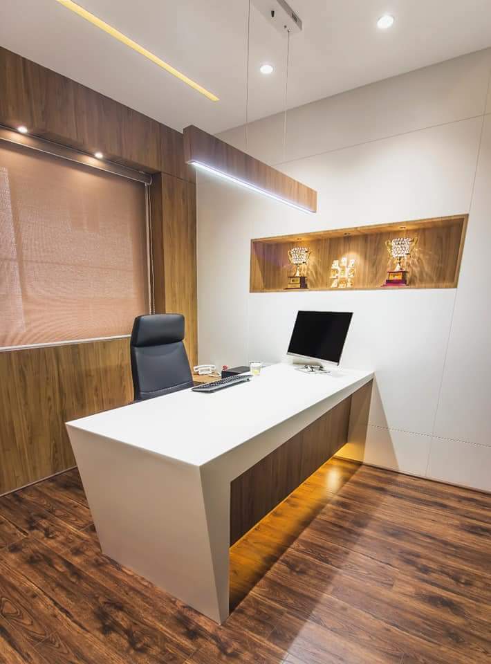 Custom office desk, wall cabinetry and wood-finish interiors